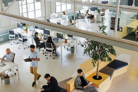 Diverse group of business people working in a modern corporate office