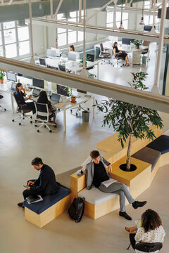 Business people working in a modern open plan office space