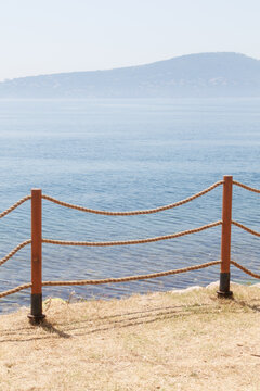 rope fence on the edge of the road