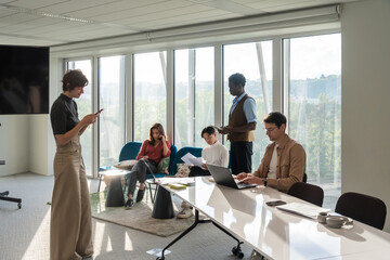 Team Collaborating In Bright Office