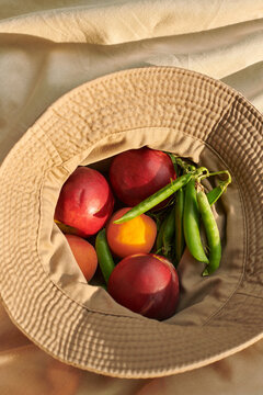 Peaches, Apricots, and Peas in a Hat