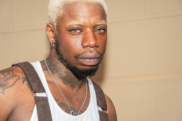 Flash Portrait Of Man With Blonde Hair And Nose Ring