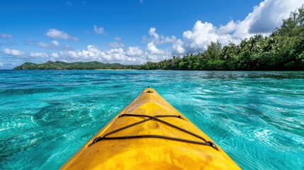 Kayaking through crystal clear turquoise waters surrounded by lush tropical foliage