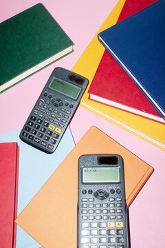 Math counting calculators and books in the office business desk  