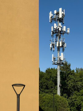 Cell Phone tower  by building background 