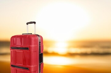 Summer vacation Suitcase at  bright Tropical Beach