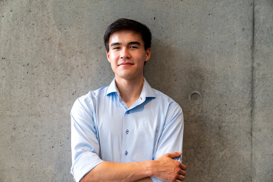 Confident businessman looking at camera