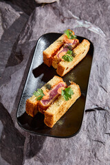 Delicious Japanese Tuna Sando Sandwich on Slate Background – Modern Cuisine Photography