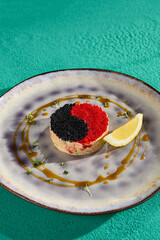 Yin Yang Crab Salad with Tobiko Caviar and Lemon on Elegant Plate