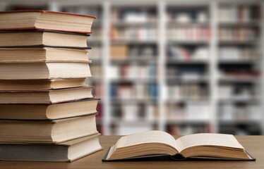 Set of reading books on table in library, education