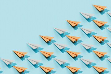 Angled Pattern of Paper Planes on Blue Background