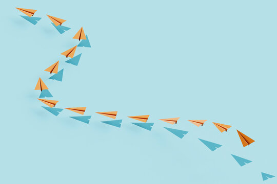 Curved Formation of Paper Planes on Blue Background