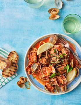 Clams in a garlic tomato sauce.