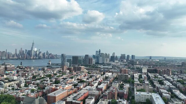 Aerial View of Hoboken downtown and Manhattan Skyline on the background.