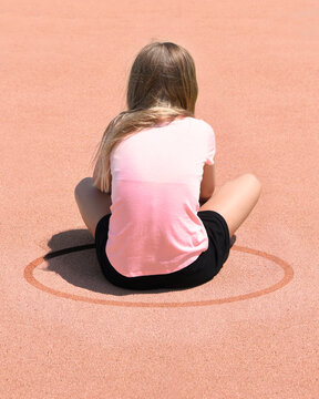 Child Waiting in Circle Alone