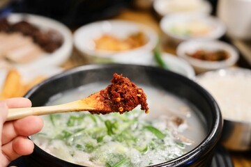 Korean chilli paste (dadaegi), that used as a condiment in gukbap (soup with rice), such as this...