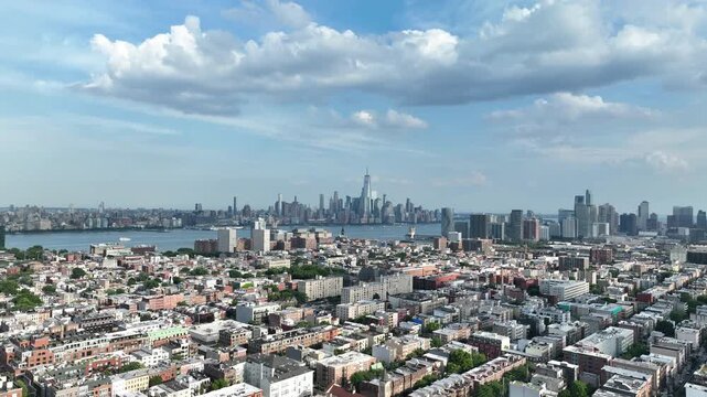 Aerial View of Hoboken downtown and Manhattan Skyline on the background.