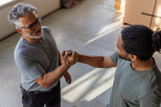 Excited technicians celebrating after great job done