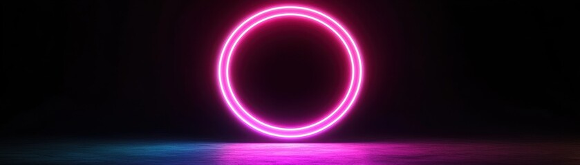 Obraz premium A vibrant neon circle glowing against a dark background, perfect for creative projects and modern designs.