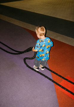 A boy on a street simulator.