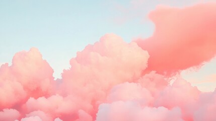 Gentle pink clouds fill the morning sky, creating a tranquil and serene atmosphere at dawn