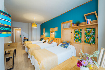Cozy Triple Bed Hotel Room