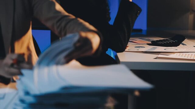 business documents businessman check legal document review Prepare documents or analysis reports, tax items, accounting documents, data contracts, office partner agreements.
