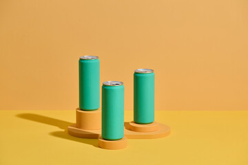 Set of three green classic aluminum beverage cans