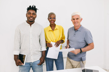 Diverse team of professionals collaborating in modern office space