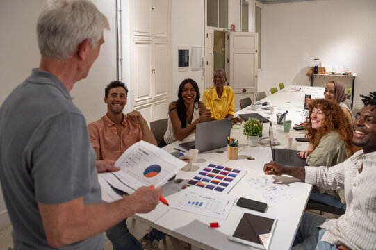 Team collaborating and brainstorming during an office meeting