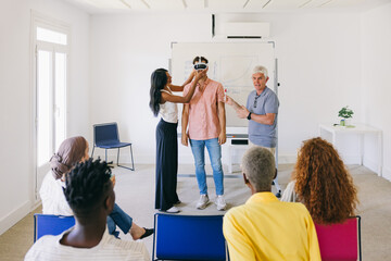 Business team exploring virtual reality headset for corporate training