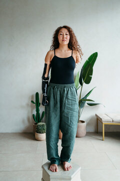 Woman With Prosthetic Arm Standing