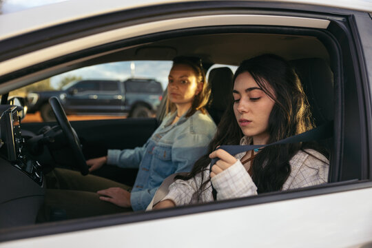 Close up of two women in a car
