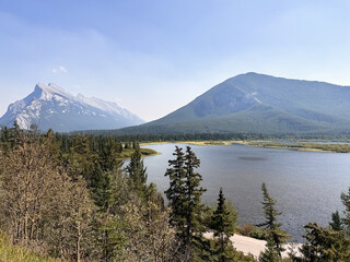 Vermilion Lakes in the Banff National Park, Alberta, Canada. Mount Rundle and Sulphur Mountain are reflected in the lakes.	