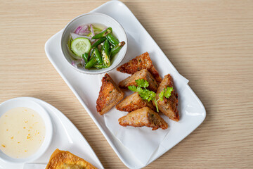 Bread fried grilled wings with vegetables