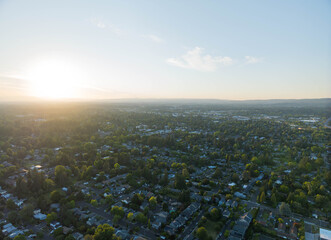 A cityscape with a beautiful sunset in the background
