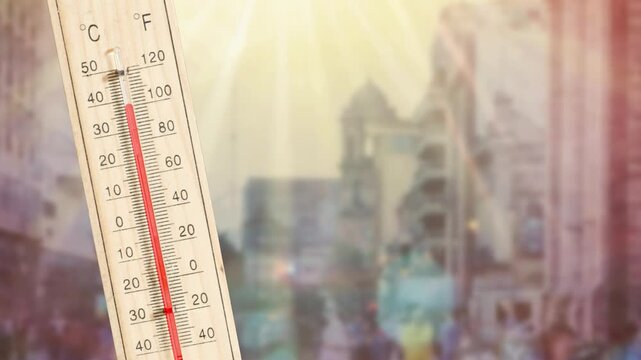 Thermometer and summer in a big city