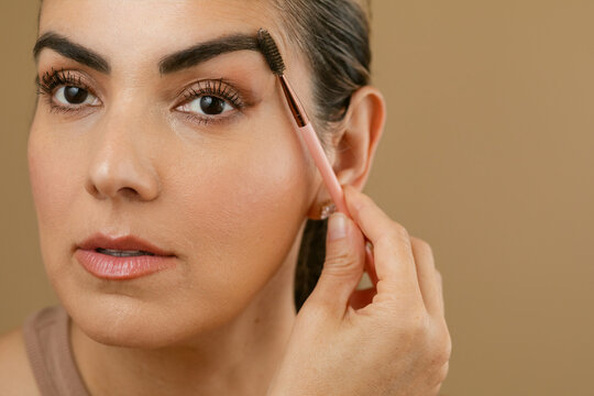 Brushing eyebrow portrait