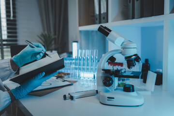 working atmosphere in the laboratory, chemistry and science specialist working in a lab with...