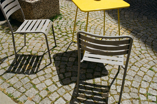 Chairs and table in sunlight