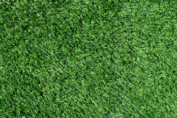Fototapeta premium Above view of green Artificial grass. Used for decorating the garden around the house to remove weeds or for cleanliness. for background and textured.