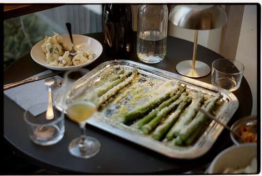 asparagus on a metal tray as an element of table decoration