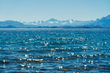 Blue waves and blue mountains