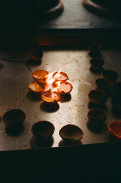 Burning clay diya lamps
