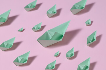 Origami Paper Boats On Blue Background Showing Leadership Concept