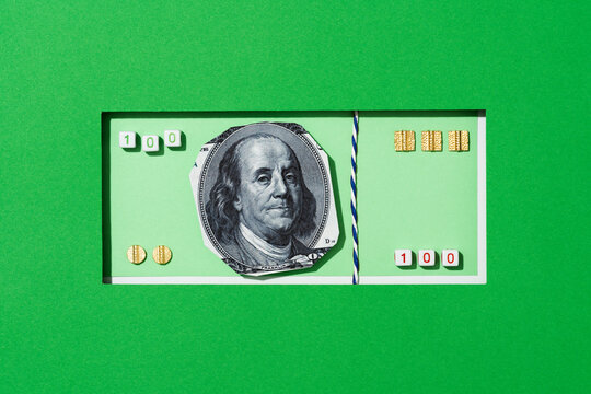 Fake one hundred dollar banknote on green background, collage style