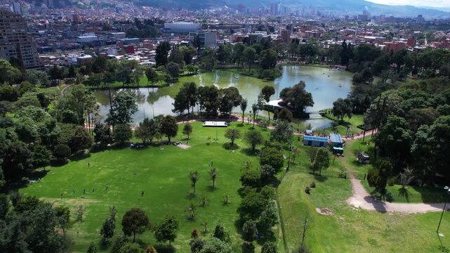Bogota, Colombia. Aerial View of Parque de los Novios, Lake and Green Grass on Sunny Day