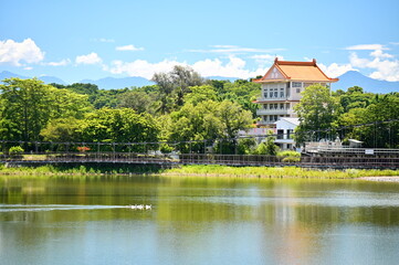 Hutoupi Reservoir in Tainan's Xinhua District is Taiwan's first reservoir, offering a rich blend of history, culture, and natural beauty with activities like lake strolling and boating.