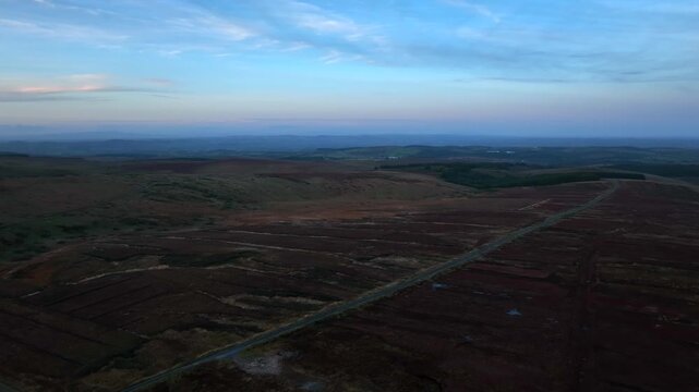 Sliabh Beagh, County Monaghan, Ireland, November 2022. Drone tracks north east above Bragan bog parallel with the Irish border with Northern Ireland.