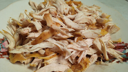 close up of shredded chicken meat